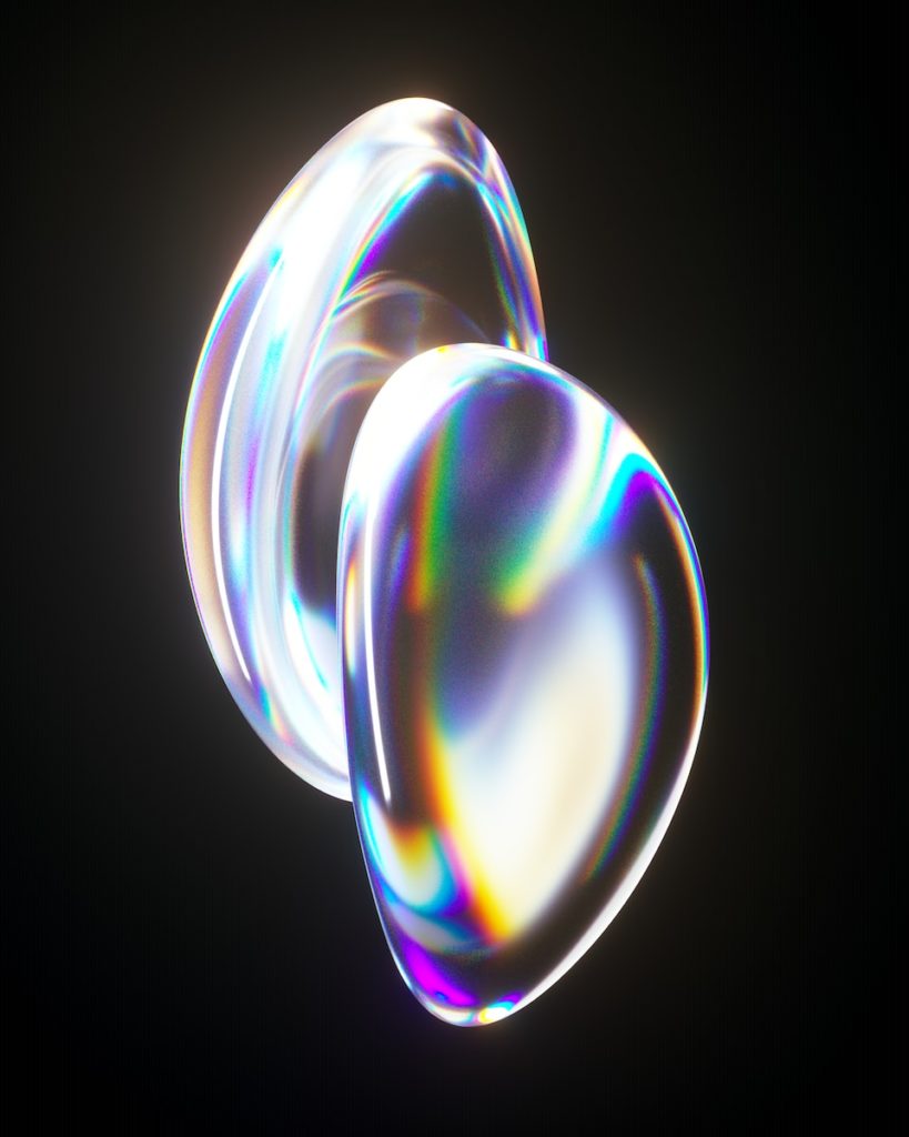 a couple of soap bubbles floating on top of each other